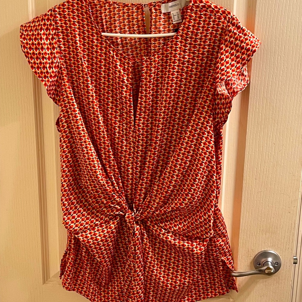 Peplum and tie waist blouse